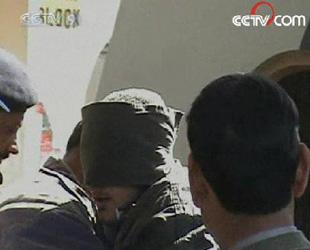 The two suspects confessed they belonged to an Islamic group, which feared Bhutto would crack down on them after coming into power.(CCTV.com)