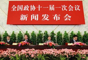 Wu Jianmin (2nd R), the spokesman for the First Plenary Session of the Eleventh National Committee of the Chinese People's Political Consultative Conference (CPPCC), answers questions from journalists during a news conference on the CPPCC session at the Great Hall of the People in Beijing, capital of China, March 2, 2008. (Xinhua Photo)