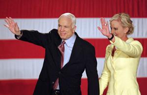 Republican US presidential candidate Senator John McCain and his wife Cindy wave at his Ohio and Texas primary election night rally in Dallas, Texas Mar. 4, 2008. McCain won the Republican nomination. (Xinhua/Reuters Photo)
