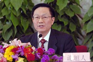 Chinese Finance Minister Xie Xuren answers a question during a press conference on economic and social development and macroeconomic regulation held by the First Session of the 11th National People's Congress (NPC) at the Great Hall of the People in Beijing, capital of China, March 6, 2008. (Xinhua Photo)