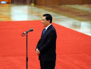 Chinese President Hu Jintao speaks during meeting with deputies to the First Session of the 11th National People's Congress (NPC) as well as members of the 11th National Committee of the Chinese People's Political Consultative Conference (CPPCC) from China's Hong Kong Special Administrative Region (SAR) and Macao SAR at the Great Hall of the People in Beijing, capital of China, March 6, 2008.(Xinhua Photo)