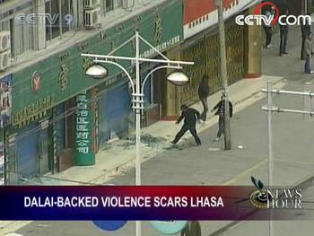 Witnesses say the unrest started around 1 p.m. on Friday. Several people clashed with and threw stones at the local police near the Ramogia Monastery in downtown Lhasa, the capital of southwest China's Tibet Autonomous Region. (CCTV.com)