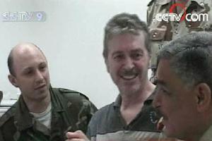 Richard Butler who worked for the US television network CBS was found during a military sweep with a sack over his head and his hands tied. (CCTV.com)