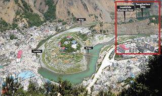 An aerial view of Tangjiashan lake (in red box) near Beichuan county May 27, 2008. Troops were digging a diversion channel to prevent the lake from bursting its banks and threatening more misery to millions of people downstream. [China Daily]