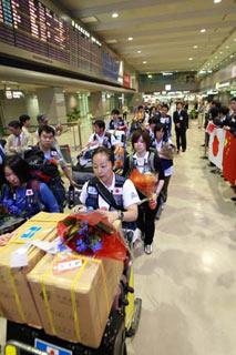 Members of Japanese medical team arrive at the Narita airport in Chiba Prefecture, Japan, June 2, 2008.  (Xinhua Photo)