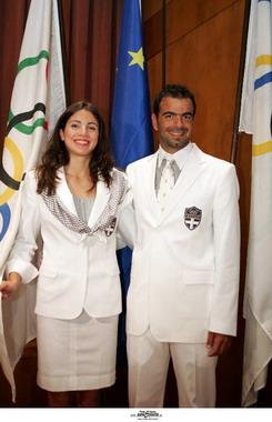 The&nbsp;outfits&nbsp;will&nbsp;be&nbsp;mainly&nbsp;white&nbsp;and&nbsp;the&nbsp;female&nbsp;athletes&nbsp;will&nbsp;wear&nbsp;a&nbsp;matching&nbsp;silk&nbsp;scarf&nbsp;with&nbsp;gray&nbsp;stripes.