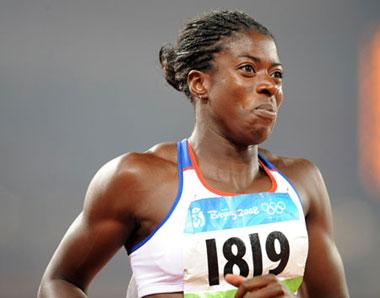 Christine Ohuruogu of Great Britain reacts after the women's 400m final at the National Stadium, also known as the Bird's Nest, during Beijing 2008 Olympic Games in Beijing, China, Aug. 19, 2008. Christine Ohuruogu won the match. (Xinhua/Guo Dayue)