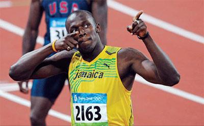 Jamaica's&nbsp;Usain&nbsp;Bolt&nbsp;celebrates&nbsp;after&nbsp;winning&nbsp;the&nbsp;men's&nbsp;200m&nbsp;semi-final&nbsp;2&nbsp;yesterday.&nbsp;He&nbsp;won&nbsp;ahead&nbsp;of&nbsp;US&nbsp;athletes&nbsp;Shawn&nbsp;Crawford&nbsp;and&nbsp;Wallace&nbsp;Spearmon.