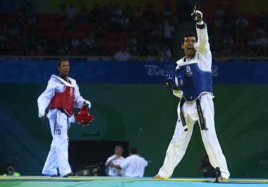 Guillermo&nbsp;Perez&nbsp;(blue)&nbsp;of&nbsp;Mexico&nbsp;celebrates&nbsp;after&nbsp;defeating&nbsp;Yulis&nbsp;Gabriel&nbsp;Mercedes&nbsp;of&nbsp;Dominican&nbsp;Republic&nbsp;during&nbsp;the&nbsp;women’s&nbsp;49kg&nbsp;gold&nbsp;medal&nbsp;match&nbsp;at&nbsp;the&nbsp;Beijing&nbsp;Olympic&nbsp;Games&nbsp;taekwondo&nbsp;event&nbsp;in&nbsp;Beijing,&nbsp;China,&nbsp;Aug.&nbsp;20,&nbsp;2008.&nbsp;Guillermo&nbsp;Perez&nbsp;won&nbsp;the&nbsp;match&nbsp;and&nbsp;got&nbsp;the&nbsp;gold&nbsp;medal.&nbsp;(Xinhua&nbsp;Photo)