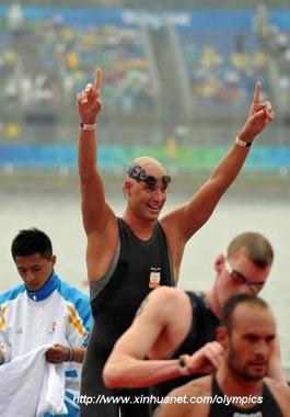 Maarten van der Weijden of the Netherlands celebrates after men's marathon 10km of Beijing 2008 Olympic Games swimming event in Beijing, China, Aug. 21, 2008. Maarten van der Weijden grabbed the gold medal. (Xinhua/Wang Lei)