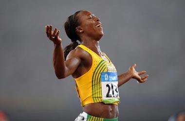 Veronica Campbell-Brown of Jamaica jubilates after winning the women's 200m final at the National Stadium, also known as the Bird's Nest, during Beijing 2008 Olympic Games in Beijing, China, Aug. 21, 2008. (Xinhua Photo)
