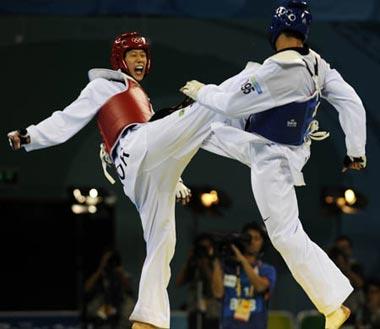 Son&nbsp;Taejin&nbsp;(red)&nbsp;of&nbsp;South&nbsp;Korea&nbsp;competes&nbsp;in&nbsp;Men&nbsp;-68kg&nbsp;Gold&nbsp;Medal&nbsp;contest&nbsp;against&nbsp;Mark&nbsp;Lopez&nbsp;of&nbsp;the&nbsp;U.S.&nbsp;at&nbsp;USTB&nbsp;Gymnasium&nbsp;in&nbsp;Beijing,&nbsp;China,&nbsp;Aug.&nbsp;21,&nbsp;2008.&nbsp;Son&nbsp;Taejin&nbsp;defeated&nbsp;Mark&nbsp;Lopez&nbsp;by&nbsp;final&nbsp;score&nbsp;3-2&nbsp;and&nbsp;won&nbsp;the&nbsp;gold&nbsp;medal&nbsp;of&nbsp;the&nbsp;event.&nbsp;(Xinhua/Zou&nbsp;Zheng)
