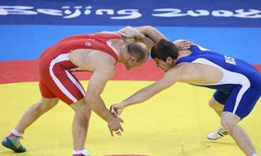Artur&nbsp;Taymazov&nbsp;(red)&nbsp;of&nbsp;Uzbekistan&nbsp;fights&nbsp;against&nbsp;Bakhtiyar&nbsp;Akhmedov&nbsp;of&nbsp;Russia&nbsp;in&nbsp;their&nbsp;men's&nbsp;freestyle&nbsp;120kg&nbsp;gold&nbsp;medal&nbsp;match&nbsp;of&nbsp;the&nbsp;Beijing&nbsp;2008&nbsp;Olympic&nbsp;Games&nbsp;Wrestling&nbsp;event&nbsp;in&nbsp;Beijing,&nbsp;China,&nbsp;Aug.&nbsp;21,&nbsp;2008.&nbsp;Artur&nbsp;Taymazov&nbsp;beat&nbsp;Bakhtiyar&nbsp;Akhmedov&nbsp;and&nbsp;grabbed&nbsp;the&nbsp;gold.(Xinhua&nbsp;Photo)