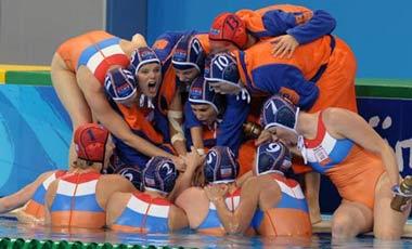 Players of the Netherlands cheer for themselves during the women's gold medal match between the Netherlands and the United States of the Beijing 2008 Olympic Games water polo event at Yingdong Natatorium of National Olympic Sports Center in Beijing, China, August 21, 2008. The Netherlands beat the United States 9-8 and grabbed the gold medal in this event.(Xinhua Photo)