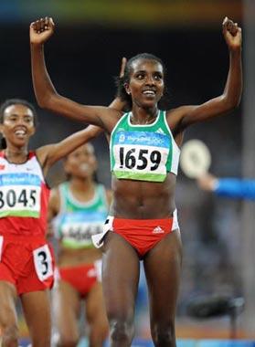 Tirunesh&nbsp;Dibaba&nbsp;of&nbsp;Ethiopia&nbsp;celebrates&nbsp;after&nbsp;the&nbsp;women's&nbsp;5,000m&nbsp;final&nbsp;at&nbsp;the&nbsp;National&nbsp;Stadium,&nbsp;also&nbsp;known&nbsp;as&nbsp;the&nbsp;Bird's&nbsp;Nest,&nbsp;during&nbsp;Beijing&nbsp;2008&nbsp;Olympic&nbsp;Games&nbsp;in&nbsp;Beijing,&nbsp;China,&nbsp;Aug.&nbsp;22,&nbsp;2008.&nbsp;Tirunesh&nbsp;Dibab&nbsp;won&nbsp;the&nbsp;gold.(Xinhua/Guo&nbsp;Dayue)