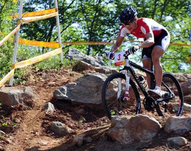 Sabine&nbsp;Spitz&nbsp;of&nbsp;Germany&nbsp;competes&nbsp;during&nbsp;the&nbsp;women's&nbsp;cross&nbsp;country&nbsp;of&nbsp;the&nbsp;Beijing&nbsp;Olymic&nbsp;Games&nbsp;cycling-mountain&nbsp;bike&nbsp;event&nbsp;at&nbsp;Laoshan&nbsp;Mountain&nbsp;Bike&nbsp;Course&nbsp;in&nbsp;Beijing,&nbsp;China,&nbsp;Aug.&nbsp;23,&nbsp;2008.&nbsp;Sabine&nbsp;Spitz&nbsp;of&nbsp;Germany&nbsp;claimed&nbsp;the&nbsp;title&nbsp;in&nbsp;this&nbsp;event&nbsp;with&nbsp;a&nbsp;time&nbsp;of&nbsp;1:45.11.(Xinhua&nbsp;Photo/Zhang&nbsp;Duo)