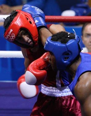 Felix&nbsp;Diaz&nbsp;(blue)&nbsp;of&nbsp;Dominican&nbsp;Rep.&nbsp;competes&nbsp;during&nbsp;Men's&nbsp;Light&nbsp;Welter&nbsp;(64kg)&nbsp;Final&nbsp;Bout&nbsp;between&nbsp;Felix&nbsp;Diaz&nbsp;of&nbsp;Dominican&nbsp;Rep.&nbsp;and&nbsp;Manus&nbsp;Boonjumnong&nbsp;of&nbsp;Thailand&nbsp;of&nbsp;Beijing&nbsp;2008&nbsp;Olympic&nbsp;Games&nbsp;boxing&nbsp;event&nbsp;at&nbsp;Workers'&nbsp;Gymnasium&nbsp;in&nbsp;Beijing,&nbsp;China,&nbsp;Aug.&nbsp;23,&nbsp;2008.&nbsp;Felix&nbsp;Diaz&nbsp;defeated&nbsp;Manus&nbsp;Boonjumnong,&nbsp;and&nbsp;won&nbsp;the&nbsp;gold&nbsp;medal&nbsp;of&nbsp;the&nbsp;event.&nbsp;(Xinhua/Lu&nbsp;Mingxiang)