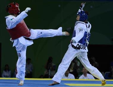 Maria&nbsp;del&nbsp;Rosario&nbsp;Espinoza&nbsp;(red)&nbsp;of&nbsp;Mexico&nbsp;fights&nbsp;against&nbsp;Nina&nbsp;Solheim&nbsp;of&nbsp;Norway&nbsp;during&nbsp;the&nbsp;Taekwondo&nbsp;women&nbsp;+67kg&nbsp;Gold&nbsp;medal&nbsp;contest&nbsp;at&nbsp;the&nbsp;Beijing&nbsp;Olympic&nbsp;Games&nbsp;in&nbsp;Beijing,&nbsp;China,&nbsp;Aug.&nbsp;23,&nbsp;2008.&nbsp;Maria&nbsp;del&nbsp;Rosario&nbsp;Espinoza&nbsp;defeated&nbsp;Nina&nbsp;Solheim&nbsp;and&nbsp;won&nbsp;the&nbsp;gold&nbsp;medal.(Xinhua&nbsp;Photo)