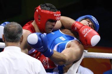 Rakhim&nbsp;Chakhkiev&nbsp;(red)&nbsp;of&nbsp;Russia&nbsp;competes&nbsp;against&nbsp;Clemente&nbsp;Russo&nbsp;of&nbsp;Italy&nbsp;during&nbsp;Men's&nbsp;Heavy&nbsp;(91kg)&nbsp;Final&nbsp;Bout&nbsp;of&nbsp;Beijing&nbsp;2008&nbsp;Olympic&nbsp;Games&nbsp;boxing&nbsp;event&nbsp;at&nbsp;Workers'&nbsp;Gymnasium&nbsp;in&nbsp;Beijing,&nbsp;China,&nbsp;Aug.&nbsp;23,&nbsp;2008.&nbsp;Rakhim&nbsp;Chakhkiev&nbsp;defeated&nbsp;Clemente&nbsp;Russo&nbsp;and&nbsp;won&nbsp;the&nbsp;gold&nbsp;medal&nbsp;of&nbsp;the&nbsp;event.&nbsp;(Xinhua/Lu&nbsp;Mingxiang)
