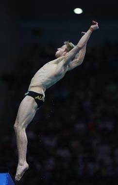 Matthew Mitcham of Australia performs a dive during Men's 10m Platform Final of Beijing 2008 Olympic Games diving event in Beijing, China, Aug. 23, 2008. Matthew Mitcham claimed the gold of the event. (Xinhua/Liu Yu)