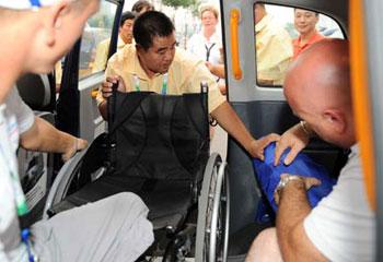 A&nbsp;volunteer&nbsp;helps&nbsp;move&nbsp;the&nbsp;wheelchair&nbsp;of&nbsp;French&nbsp;athlete&nbsp;Nicolas&nbsp;Peifer&nbsp;into&nbsp;a&nbsp;barrier-free&nbsp;taxi&nbsp;in&nbsp;front&nbsp;of&nbsp;the&nbsp;Main&nbsp;Press&nbsp;Center&nbsp;in&nbsp;Beijing&nbsp;Sept.&nbsp;4,&nbsp;2008.&nbsp;Many&nbsp;barrier-free&nbsp;facilities&nbsp;were&nbsp;installed&nbsp;in&nbsp;buses,&nbsp;taxis&nbsp;and&nbsp;subway&nbsp;stations,&nbsp;making&nbsp;it&nbsp;more&nbsp;convenient&nbsp;for&nbsp;disable&nbsp;people&nbsp;to&nbsp;get&nbsp;on&nbsp;and&nbsp;off.(Xinhua&nbsp;Photo)