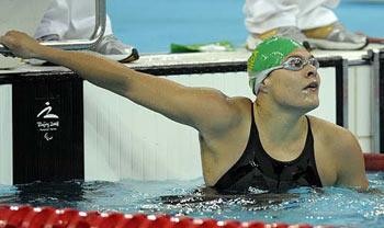 Natalie&nbsp;du&nbsp;Toit&nbsp;of&nbsp;South&nbsp;Africa&nbsp;looks&nbsp;at&nbsp;the&nbsp;result&nbsp;board&nbsp;after&nbsp;winning&nbsp;the&nbsp;women's&nbsp;100m&nbsp;butterfly&nbsp;S9&nbsp;final&nbsp;during&nbsp;the&nbsp;2008&nbsp;Beijing&nbsp;Paralympic&nbsp;Games&nbsp;at&nbsp;the&nbsp;National&nbsp;Aquatics&nbsp;Center&nbsp;in&nbsp;Beijing&nbsp;on&nbsp;September&nbsp;7,&nbsp;2008.&nbsp;South&nbsp;Africa's&nbsp;Du&nbsp;Toit,&nbsp;who&nbsp;finished&nbsp;16th&nbsp;in&nbsp;the&nbsp;Olympics&nbsp;women's&nbsp;10&nbsp;kilometres&nbsp;swim,&nbsp;shaved&nbsp;almost&nbsp;half-a-second&nbsp;off&nbsp;her&nbsp;previous&nbsp;mark&nbsp;in&nbsp;the&nbsp;100m&nbsp;butterfly&nbsp;heats&nbsp;on&nbsp;the&nbsp;first&nbsp;day&nbsp;of&nbsp;competition.Agencies]&nbsp;