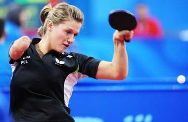 Natalia&nbsp;Partyka&nbsp;of&nbsp;Poland&nbsp;returns&nbsp;the&nbsp;ball&nbsp;during&nbsp;a&nbsp;Women's&nbsp;Individual&nbsp;(Class&nbsp;10)&nbsp;Group&nbsp;A&nbsp;match&nbsp;against&nbsp;Audrey&nbsp;le&nbsp;Morvanat&nbsp;of&nbsp;France&nbsp;at&nbsp;the&nbsp;Beijing&nbsp;2008&nbsp;Paralympic&nbsp;Games&nbsp;table&nbsp;tennis&nbsp;event&nbsp;on&nbsp;Sept.&nbsp;7,&nbsp;2008.&nbsp;Partyka&nbsp;won&nbsp;3-0.&nbsp;The&nbsp;19-year-old&nbsp;Polish&nbsp;player,&nbsp;who&nbsp;was&nbsp;born&nbsp;with&nbsp;a&nbsp;right&nbsp;arm&nbsp;that&nbsp;ends&nbsp;at&nbsp;the&nbsp;elbow,&nbsp;is&nbsp;the&nbsp;Paralympic&nbsp;champion&nbsp;in&nbsp;Athen&nbsp;2004.&nbsp;Before&nbsp;defending&nbsp;her&nbsp;Paralympic&nbsp;title,&nbsp;she&nbsp;played&nbsp;in&nbsp;the&nbsp;table&nbsp;tennis&nbsp;team&nbsp;event&nbsp;at&nbsp;Beijing&nbsp;2008&nbsp;Olympic&nbsp;Games,&nbsp;which&nbsp;made&nbsp;her&nbsp;one&nbsp;of&nbsp;only&nbsp;two&nbsp;athletes,&nbsp;along&nbsp;with&nbsp;South&nbsp;African&nbsp;swimmer&nbsp;Natalie&nbsp;du&nbsp;Toit,&nbsp;to&nbsp;compete&nbsp;in&nbsp;both&nbsp;Olympic&nbsp;and&nbsp;Paralympic&nbsp;in&nbsp;Beijing.(Xinhua&nbsp;Photo)