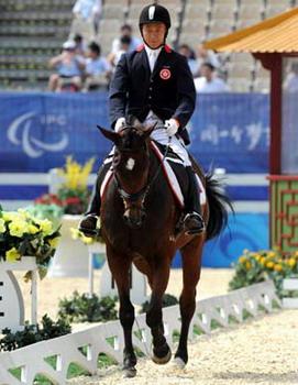 Rider&nbsp;Yip&nbsp;Siu&nbsp;Hong&nbsp;of&nbsp;Hong&nbsp;Kong&nbsp;rides&nbsp;horse&nbsp;Icy&nbsp;Bet&nbsp;during&nbsp;the&nbsp;Individual&nbsp;Championship&nbsp;Test&nbsp;(Grade&nbsp;II)&nbsp;of&nbsp;the&nbsp;Equestrian&nbsp;Events&nbsp;of&nbsp;the&nbsp;Beijing&nbsp;2008&nbsp;Paralympic&nbsp;Games&nbsp;at&nbsp;Hong&nbsp;Kong&nbsp;Olympic&nbsp;Equestrian&nbsp;Venue&nbsp;(Sha&nbsp;Tin)&nbsp;in&nbsp;Hong&nbsp;Kong,&nbsp;south&nbsp;China,&nbsp;Sept.&nbsp;8,&nbsp;2008.&nbsp;Yip&nbsp;Siu&nbsp;Hong&nbsp;finished&nbsp;18th&nbsp;with&nbsp;a&nbsp;score&nbsp;of&nbsp;50.545.(Xinhua&nbsp;Photo)