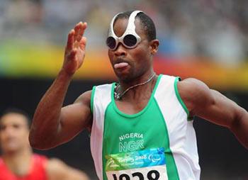 Nigeria's&nbsp;Adekunle&nbsp;Adesoji&nbsp;competes&nbsp;during&nbsp;the&nbsp;semifinal&nbsp;of&nbsp;men's&nbsp;100m&nbsp;T12&nbsp;of&nbsp;the&nbsp;Beijing&nbsp;2008&nbsp;Paralympic&nbsp;Games,&nbsp;at&nbsp;the&nbsp;National&nbsp;Stadium,&nbsp;also&nbsp;known&nbsp;as&nbsp;the&nbsp;Bird's&nbsp;Nest,&nbsp;in&nbsp;Beijing,&nbsp;China,&nbsp;Sept.&nbsp;9,&nbsp;2008.&nbsp;Adesoji&nbsp;took&nbsp;the&nbsp;first&nbsp;place&nbsp;of&nbsp;his&nbsp;group&nbsp;with&nbsp;a&nbsp;time&nbsp;of&nbsp;11.00&nbsp;seconds&nbsp;and&nbsp;advanced&nbsp;into&nbsp;the&nbsp;final.&nbsp;(Xinhua&nbsp;Photo)