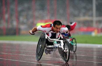 Japan's&nbsp;Susumu&nbsp;Kangawa&nbsp;competes&nbsp;in&nbsp;the&nbsp;rain&nbsp;during&nbsp;the&nbsp;first&nbsp;round&nbsp;competition&nbsp;of&nbsp;men's&nbsp;400m&nbsp;T53&nbsp;of&nbsp;the&nbsp;Beijing&nbsp;2008&nbsp;Paralympic&nbsp;Games,&nbsp;at&nbsp;the&nbsp;National&nbsp;Stadium,&nbsp;also&nbsp;known&nbsp;as&nbsp;the&nbsp;Bird's&nbsp;Nest,&nbsp;in&nbsp;Beijing,&nbsp;China,&nbsp;Sept.&nbsp;9,&nbsp;2008.&nbsp;(Xinhua/Li&nbsp;Ga)