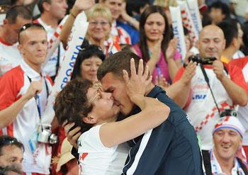 Branimir&nbsp;Budetic&nbsp;of&nbsp;Croatia&nbsp;shares&nbsp;a&nbsp;moment&nbsp;with&nbsp;his&nbsp;mother&nbsp;after&nbsp;finishing&nbsp;second&nbsp;during&nbsp;the&nbsp;final&nbsp;of&nbsp;the&nbsp;men's&nbsp;javelin&nbsp;F11-12&nbsp;classification&nbsp;event&nbsp;at&nbsp;the&nbsp;2008&nbsp;Beijing&nbsp;Paralympic&nbsp;Games&nbsp;in&nbsp;Beijing&nbsp;on&nbsp;September&nbsp;10,&nbsp;2008.