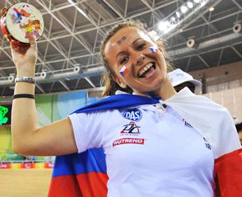 A foreign spectator cheers for cycling athletes with a traditional Chinese tabor during the Beijing 2008 Paralympic Games at the Laoshan Velodrome on September 10, 2008.