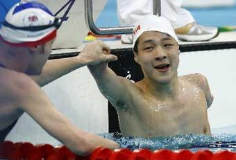 China's&nbsp;Xu&nbsp;Qing&nbsp;celebrates&nbsp;as&nbsp;a&nbsp;new&nbsp;world&nbsp;record&nbsp;during&nbsp;the&nbsp;men's&nbsp;50&nbsp;meter&nbsp;Butterfly&nbsp;S6&nbsp;final&nbsp;at&nbsp;the&nbsp;Beijing&nbsp;2008&nbsp;Paralympic&nbsp;Games&nbsp;on&nbsp;Saturday,&nbsp;September&nbsp;13,&nbsp;2008&nbsp;in&nbsp;Beijing.&nbsp;[Photo:&nbsp;Xinhua]