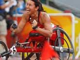 Canada&acute;s Chantal Petitclerc wins women&acute;s 200m T54 gold