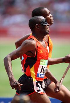 Angola's&nbsp;Jose&nbsp;Armando&nbsp;(L)&nbsp;and&nbsp;his&nbsp;guide&nbsp;compete&nbsp;during&nbsp;the&nbsp;first&nbsp;round&nbsp;match&nbsp;of&nbsp;men's&nbsp;400m&nbsp;T11&nbsp;event&nbsp;at&nbsp;the&nbsp;National&nbsp;Stadium,&nbsp;also&nbsp;known&nbsp;as&nbsp;the&nbsp;Bird's&nbsp;Nest,&nbsp;during&nbsp;the&nbsp;Beijing&nbsp;2008&nbsp;Paralympic&nbsp;Games&nbsp;in&nbsp;Beijing,&nbsp;Sept.&nbsp;14,&nbsp;2008.&nbsp;Armando&nbsp;was&nbsp;qualified&nbsp;for&nbsp;the&nbsp;semifinal&nbsp;with&nbsp;a&nbsp;time&nbsp;of&nbsp;51.52&nbsp;seconds.&nbsp;(Xinhua/Zhang&nbsp;Yanhui)