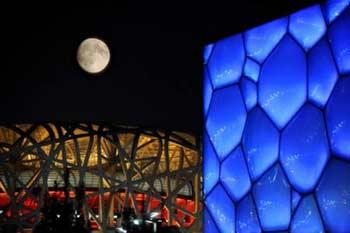 A&nbsp;nearly&nbsp;full&nbsp;moon&nbsp;over&nbsp;the&nbsp;National&nbsp;Stadium&nbsp;or&nbsp;better&nbsp;known&nbsp;as&nbsp;the&nbsp;Bird's&nbsp;Nest&nbsp;in&nbsp;Beijing&nbsp;on&nbsp;early&nbsp;September&nbsp;14,&nbsp;2008,&nbsp;which&nbsp;is&nbsp;now&nbsp;hosting&nbsp;the&nbsp;athletic&nbsp;competition&nbsp;for&nbsp;the&nbsp;2008&nbsp;Beijing&nbsp;Paralympic&nbsp;Games.&nbsp;Paralympians&nbsp;in&nbsp;Beijing&nbsp;will&nbsp;get&nbsp;a&nbsp;taste&nbsp;of&nbsp;China's&nbsp;Mid-Autumn&nbsp;Festival,&nbsp;which&nbsp;falls&nbsp;on&nbsp;September&nbsp;14&nbsp;this&nbsp;year.(Photo&nbsp;Source:&nbsp;China&nbsp;Daily/Agencies)