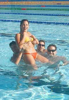 Four&nbsp;Paralympic&nbsp;athletes&nbsp;from&nbsp;Argentina&nbsp;play&nbsp;with&nbsp;water&nbsp;at&nbsp;the&nbsp;Paralympic&nbsp;Village&nbsp;in&nbsp;Beijing,&nbsp;September&nbsp;12,&nbsp;2008.