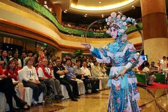 An&nbsp;actor&nbsp;performs&nbsp;Peking&nbsp;Opera&nbsp;during&nbsp;the&nbsp;Mid-Autumn&nbsp;soiree&nbsp;in&nbsp;Beijing,&nbsp;capital&nbsp;of&nbsp;China,&nbsp;Sept.&nbsp;14,&nbsp;2008.&nbsp;Some&nbsp;officials&nbsp;and&nbsp;athletes&nbsp;of&nbsp;Beijing&nbsp;Paralympic&nbsp;Games&nbsp;and&nbsp;some&nbsp;foreign&nbsp;guests&nbsp;attended&nbsp;a&nbsp;soiree&nbsp;on&nbsp;Sunday&nbsp;night&nbsp;to&nbsp;celebrate&nbsp;the&nbsp;Mid-Autumn&nbsp;Festival,&nbsp;a&nbsp;traditional&nbsp;Chinese&nbsp;festival&nbsp;for&nbsp;family&nbsp;reunions,&nbsp;by&nbsp;enjoying&nbsp;traditional&nbsp;Chinese&nbsp;culture.&nbsp;(Xinhua&nbsp;Photo)