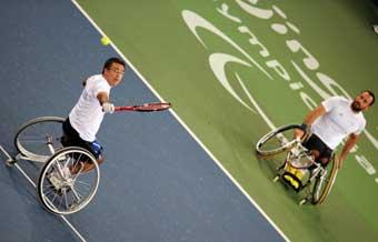 Michael&nbsp;Jeremiasz&nbsp;and&nbsp;Stephane&nbsp;Houdet&nbsp;of&nbsp;France&nbsp;compete.&nbsp;They&nbsp;beat&nbsp;Stefan&nbsp;Olsson&nbsp;and&nbsp;Peter&nbsp;Wikstrom&nbsp;of&nbsp;Switzerland&nbsp;2-0&nbsp;to&nbsp;win&nbsp;the&nbsp;gold&nbsp;medal&nbsp;of&nbsp;the&nbsp;Men's&nbsp;Doubles&nbsp;Open&nbsp;of&nbsp;the&nbsp;Wheelchair&nbsp;Tennis&nbsp;event&nbsp;during&nbsp;the&nbsp;Beijing&nbsp;2008&nbsp;Paralympic&nbsp;Games&nbsp;on&nbsp;September&nbsp;15,&nbsp;2008.&nbsp;[Xinhua]