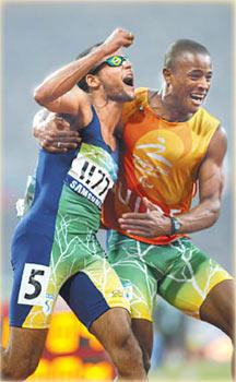 Brazil's&nbsp;Lucas&nbsp;Prado,&nbsp;left,&nbsp;and&nbsp;his&nbsp;guide&nbsp;celebrate&nbsp;after&nbsp;winning&nbsp;the&nbsp;men's&nbsp;100m&nbsp;T11&nbsp;last&nbsp;Tuesday.&nbsp;They&nbsp;went&nbsp;on&nbsp;to&nbsp;win&nbsp;the&nbsp;men's&nbsp;200m&nbsp;T11&nbsp;final&nbsp;on&nbsp;Saturday.&nbsp;Yang&nbsp;Shizhong