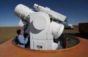 Staff members work at landing field of Shenzhou-7 spacecraft in Inner Mongolia Autonomous Region