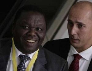 Movement for Democratic Change (MDC) leader Morgan Tsvangirai (L) arrives for the Southern African Development Community (SADC) meeting in Sandton, South Africa November 9, 2008.REUTERS/Siphiwe Sibeko