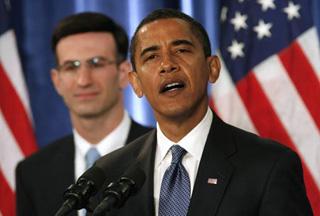 U.S. President-elect Barack Obama speaks in front of Peter Orszag (L), the current director of the Congressional Budget Office, as he announces Orszag as his choice for director of the Office of Management and Budget during a news conference in Chicago Nov. 25, 2008.(Xinhua/Reuters Photo)
