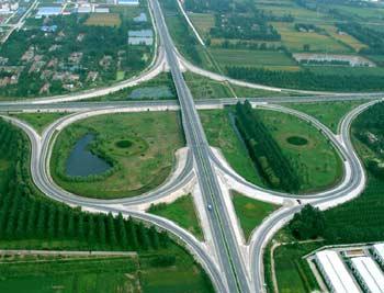 Many experts believe improving transport links is the first step in economic development, and slogans encouraging road construction were visible everywhere.