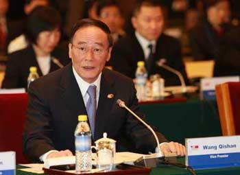 Chinese Vice Premier Wang Qishan, as special representative of president of China, addresses the opening ceremony of the Fifth China-US Strategic Economic Dialogue in Beijing, capital of China, Dec. 4, 2008.(Xinhua Photo)