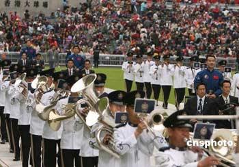 Led by Hong Kong's Silver and Pipe Band, the astronauts circled the venue in an open car.