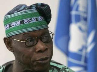Nigeria's former president Olusegun Obasanjo speaks during the official opening of peace talks between the Congolese government and the eastern Congolese rebel group of General Laurent Nkunda at the U.N. headquarters in Nairobi December 8, 2008.REUTERS/Antony Njuguna (KENYA)