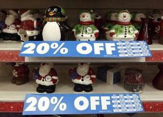 Christmas decorations on display at a Woolworths branch in Putney, west London December 14, 2008.  REUTERS/Kevin Coombs