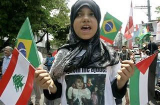 A&nbsp;girl&nbsp;shouts&nbsp;slogans&nbsp;during&nbsp;a&nbsp;protest&nbsp;against&nbsp;Israel's&nbsp;military&nbsp;strikes&nbsp;on&nbsp;Gaza&nbsp;in&nbsp;Sao&nbsp;Paulo,&nbsp;Wednesday,&nbsp;Jan.&nbsp;7,&nbsp;2009.&nbsp;(AP&nbsp;Photo/Nelson&nbsp;Antoine)