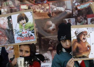 Children&nbsp;hold&nbsp;placards&nbsp;during&nbsp;a&nbsp;protest&nbsp;outside&nbsp;the&nbsp;French&nbsp;embassy&nbsp;in&nbsp;Amman&nbsp;January&nbsp;8,&nbsp;2009&nbsp;against&nbsp;the&nbsp;Israeli&nbsp;attacks&nbsp;on&nbsp;Gaza.&nbsp;The&nbsp;sign&nbsp;(L)&nbsp;reads:&nbsp;"One&nbsp;will&nbsp;become&nbsp;angry."&nbsp;[Agencies]